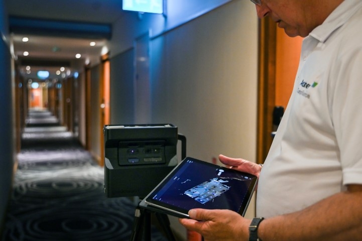 Employee holding tablet